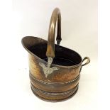 A brass coal scuttle