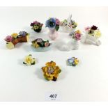 A group of vintage porcelain flower ornaments