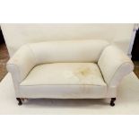 A 19th century Chesterfield small settee with drop end, stained