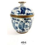 A Chinese Republic period blue and white jar with crackle glaze with brass metal banding.