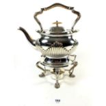 An Edwardian silver plated tea kettle on stand