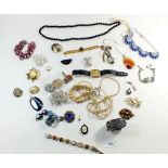 A box of various costume jewellery