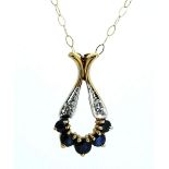 A 9ct gold sapphire and chip diamond pendant and chain