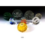 Eight various glass paperweights and dump weights