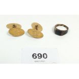 A pair of 9ct gold cufflinks, 7.8g and a 9ct gold ring inset black onyx, size L
