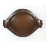 A St Dunstan Ware copper Arts and Crafts tray by Albert Edward Jones with applied silver rose