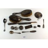 A selection of scrap silver items to include brushes, lids, spoons etc, total weight 390g