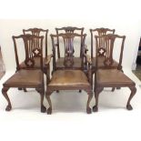 A set of six Chippendale style mahogany dining chairs on claw ball feet