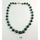 A malachite bead necklace