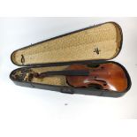 A 19th/early 20thC violin with label to interior for Jacobus Stainer and heat branded 'Stainer' to