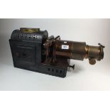 A Victorian oil fired magic lantern with copper lens by WC Hughes & Co