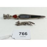 A silver Scottish stone set thistle form kilt pin and a silver small fox brooch, 4cm