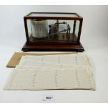 An oak cased barograph by Negretti & Zambra R/1236, with spare cards