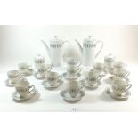 A Seyei Nagoya vintage coffee set comprising two coffee pots, twelve cups and saucers, milk and