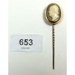 A Victorian cameo stick pin carved with a man, in yellow metal mount