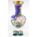 A floral cloisonne enamel vase 26cm and two cloisonne napkin rings