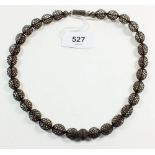 A Victorian woven hair bead necklace with silver clasp
