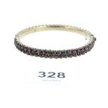 A Victorian garnet set bangle