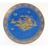 A large Carlton Ware chinoiserie charger on a blue ground, 39.5cm diameter