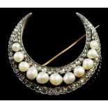 A substantial antique natural pearl and diamond set crescent form brooch, 4.8 x 4.3cm, 18.6g, with