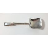 A silver fiddle handled silver caddy spoon with shovel form bowl, Birmingham 1813, by William Pugh