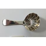 A silver shell bowl caddy spoon, Birmingham 1824, by Joseph Willmore
