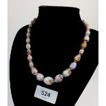 A Venetian lustred glass bead necklace