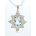 A yellow and white gold aquamarine and diamond set star form pendant (the aquamarine 1.95cts), 3.