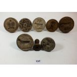 A box of 19th century turned wood butter stamps including cow, wheat, star and heart designs