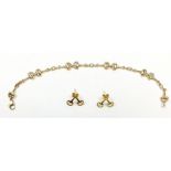 A 9ct gold horse bit bracelet and matching stirrup earrings, 10g