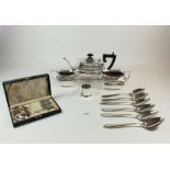 A silver plated three piece tea service, a silver plated cream jug, six tablespoons and six