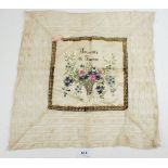 A 19thC French lace handkerchief or embroidered panel decorated with a basket of flowers and '