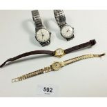 Four vintage mechanical wrist watches including Garrard and Oris