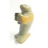 A Canadian Inuit carved greenstone walrus, signed Glen NA from Pond Inlet, 11cm