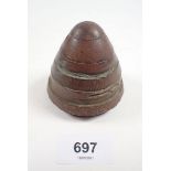 An early 20th century brass munition shell head paperweight