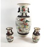A Chinese pottery vase painted warriors on a crackle ground, 35cm and two similar smaller vases