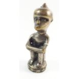 A silver plated metal African tribal figurine, 10cm