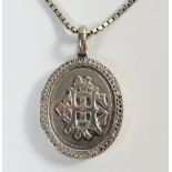 An oval silver locket (unmarked) and silver box link chain, 44g