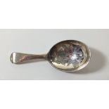 A silver Old English caddy spoon with engraved flower to bowl, London 1815, by James Beebe