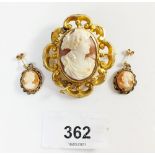 A Victorian scrollwork framed cameo brooch and a pair of 9ct gold cameo pendant earrings