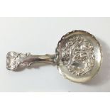 A silver caddy spoon embossed mournful maiden to bowl, Birmingham 1817, by John Bettridge