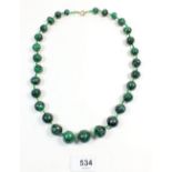 A malachite bead necklace