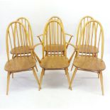 An Ercol set of six elm seated and beech stick back 'Windsor' dining chairs