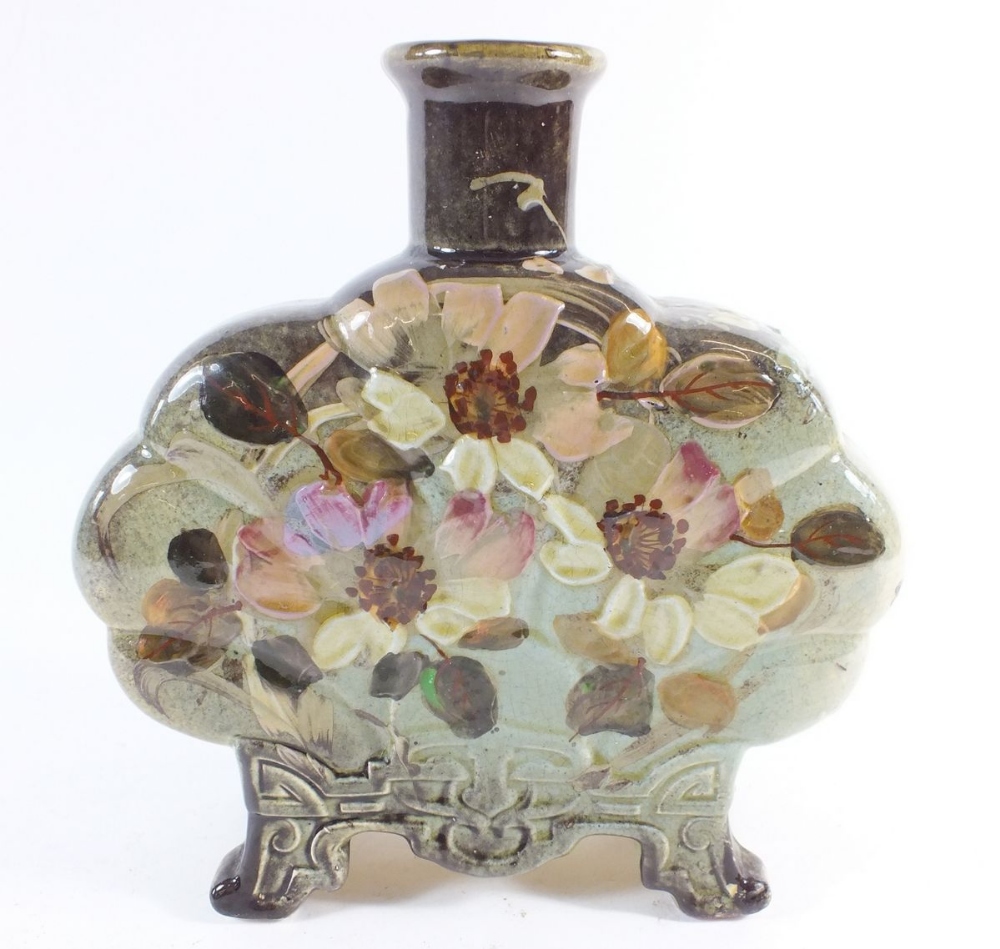 A European pottery vase decorated flowers in heavy slip glaze paint, 21cm