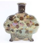 A European pottery vase decorated flowers in heavy slip glaze paint, 21cm