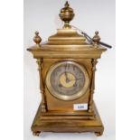 A French early 20thC heavy brass mantel clock, 36cm high.