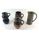 Four studio pottery jugs