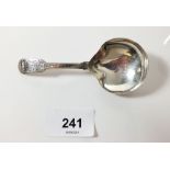 A silver fiddle pattern caddy spoon with engraved decoration, London 1812, by Thomas Richards