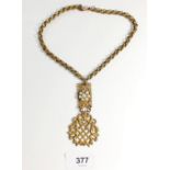 A Miriam Haskell gilt metal pendant necklace set cluster of pearls, the drop 8cm