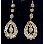 A pair of antique yellow and white metal pendant earrings set diamonds, 4cm drop (approx 3.7cts of